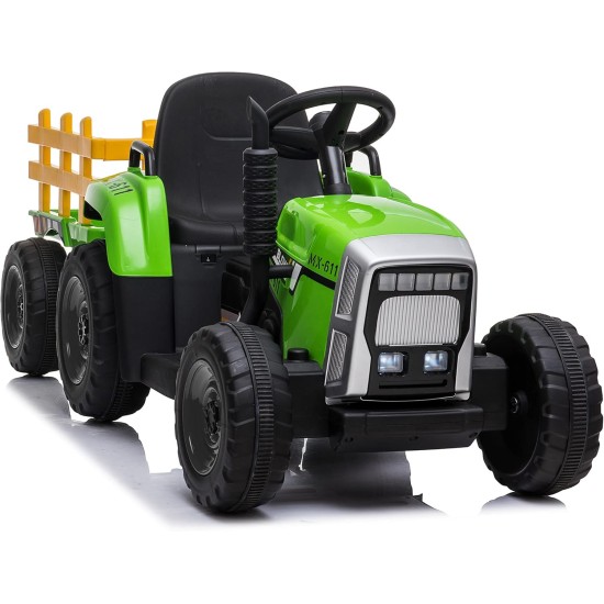 Liels elektriskais traktors ar piekabi, zaļš