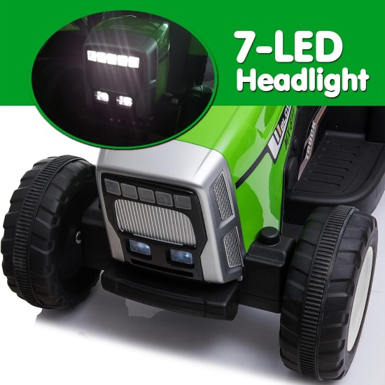 Liels elektriskais traktors ar piekabi, zaļš